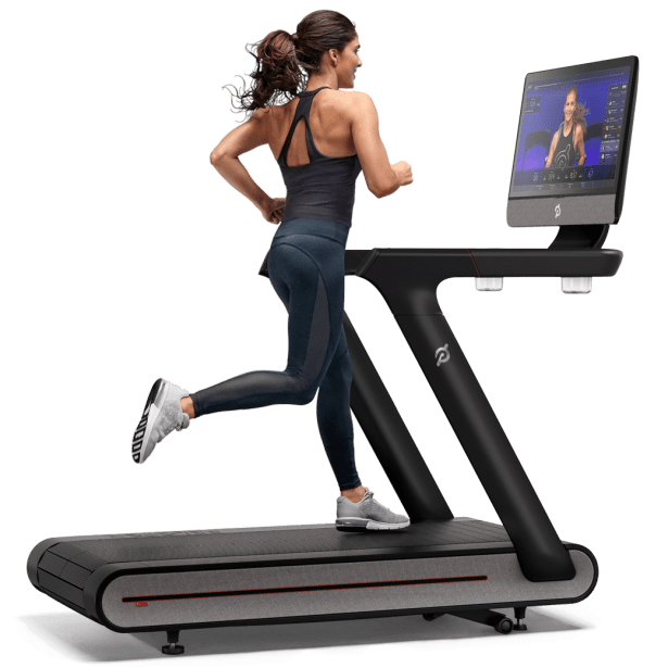 Peloton Tread Review - Woman Running on Machine